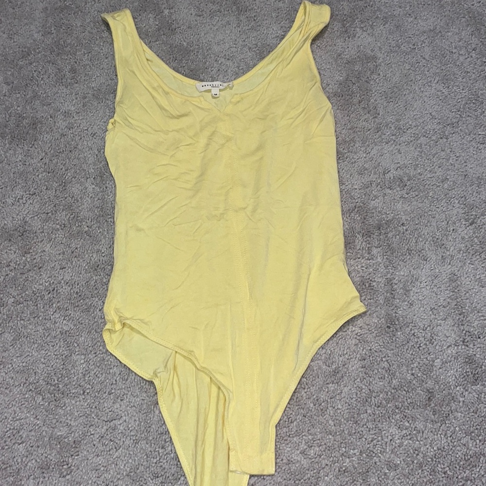 Yellow bodysuit